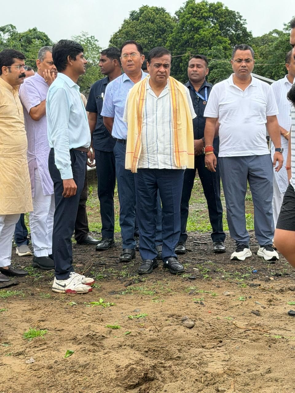 The Chief Minister with officials at the solar site